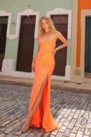 Gown covered with sequins and slit features a daring plunging V-neckline - Image 10